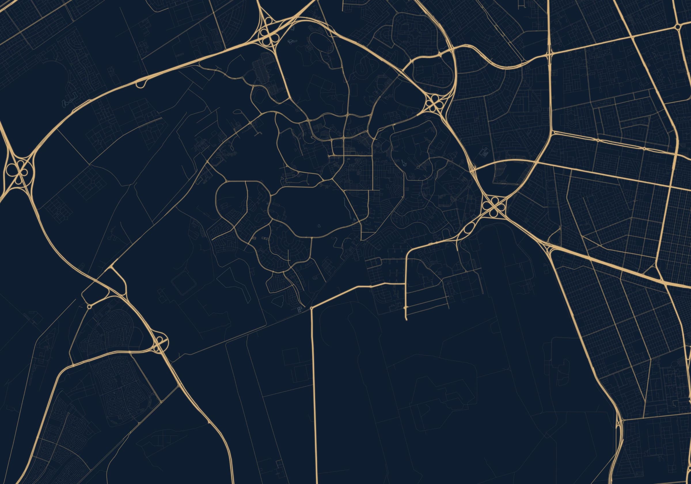Street map of Dhahran: King Fahd University, the Aramco camp and the grid of Al Khobar, drawn in brass on navy